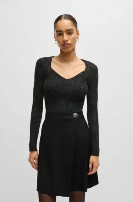 Ribbed sweater with sequin embellishments