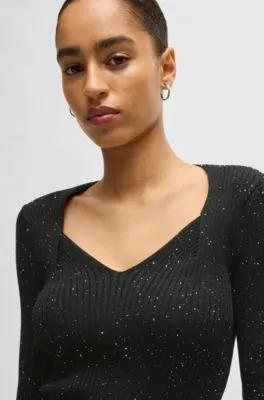 Ribbed sweater with sequin embellishments