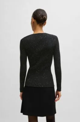 Ribbed sweater with sequin embellishments